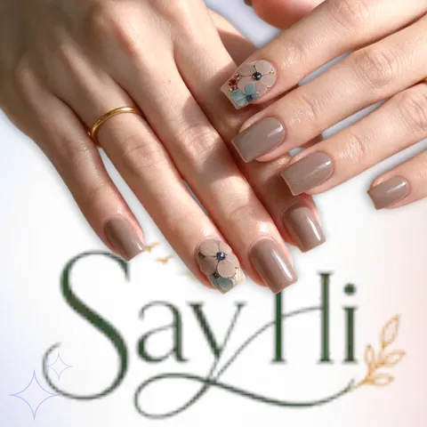 taupe gel nails with pressed flower – Say Hi Spa Hanoi