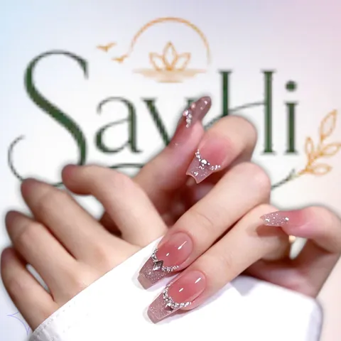 pink French nails with rhinestones – Say Hi Spa Hanoi